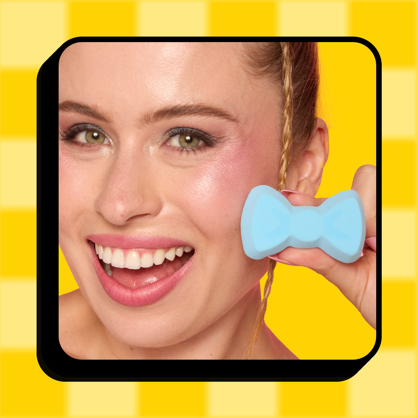 Model holding The Simpsons Makeup Sponge