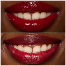 Labios de modelo usando Lip I.V. 13 Cranberry Splash.